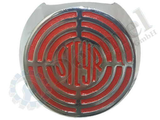 Typenschild, Steyr, rund, oben an der Motorhaube, Jubiläumsserie, Aluguss mit Ausnehmung für die Zierleiste, Hintergrund orange, Steyr Symbol verchromt