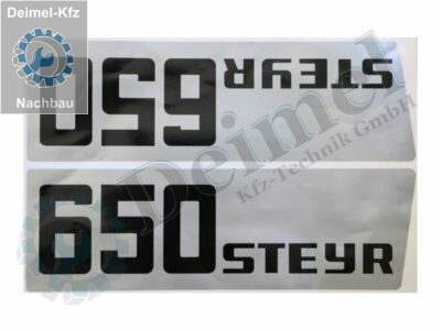 Aufkleber Set „Steyr 650“ bestehend aus 2 Stk Aufkleber – 1x rechts und 1x links an der Motorhaube, Silber mit Schwarzer Aufschrift